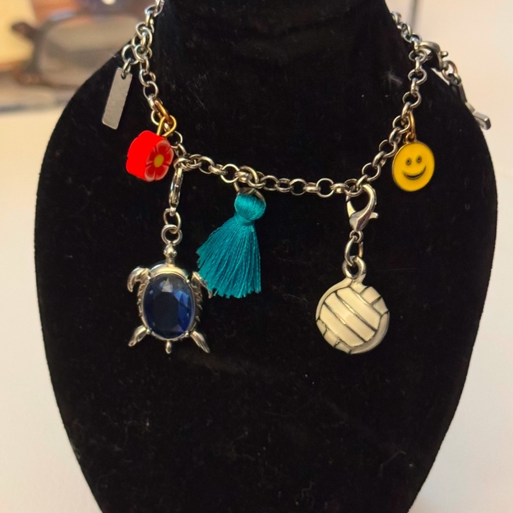 Wander Silver Tone Charm Bracelet